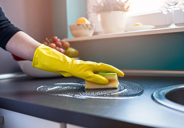 Cleaning in the Kitchen — Domestic & commercial cleaning services in Queensland, Australia