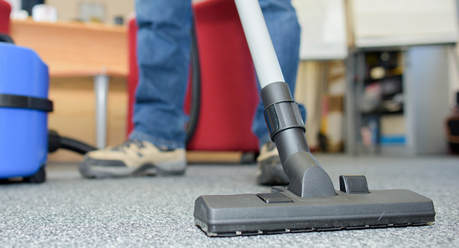 Carpet cleaning on grey carpet with specialised equipment in fraser coast